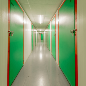 corridor with lockers on both sides locked with padlocks